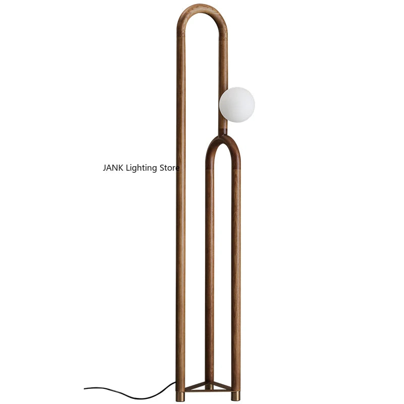 Kreative LED-Stehlampe aus dunklem Holz - Apoletta